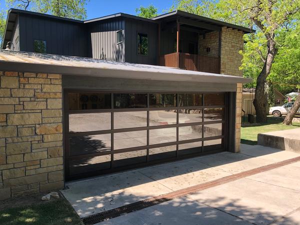 Glass garage doors add curb appeal to any home