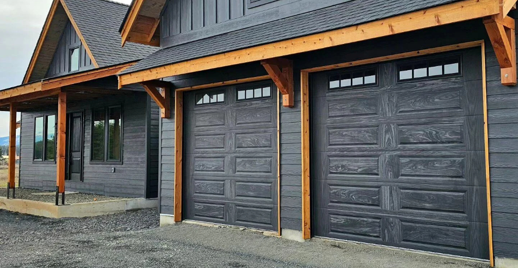 Long panel garage doors in carbon oak on new build in Denver