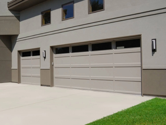 Recessed long panel garage door, spit doors