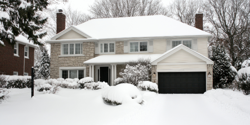 Black garage door boosting curb appeal