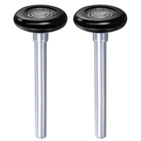 Two adjacent garage door rollers