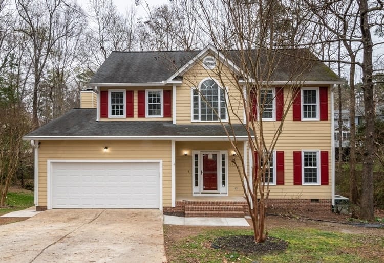 Suburban house with white paneled garage door