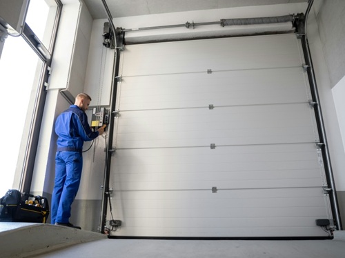 Stainless steel overhead door tracks