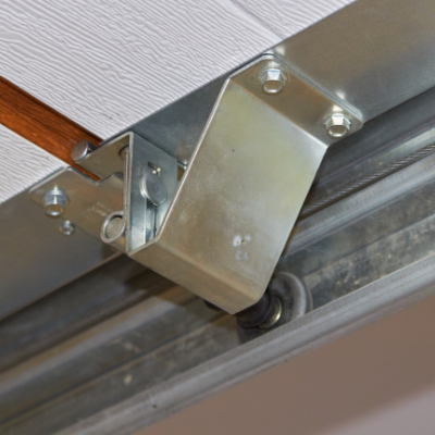 Crooked garage door binding in the tracks