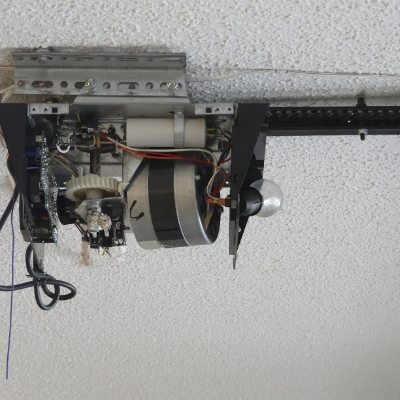 Garage door opener motor and internal gears illustration