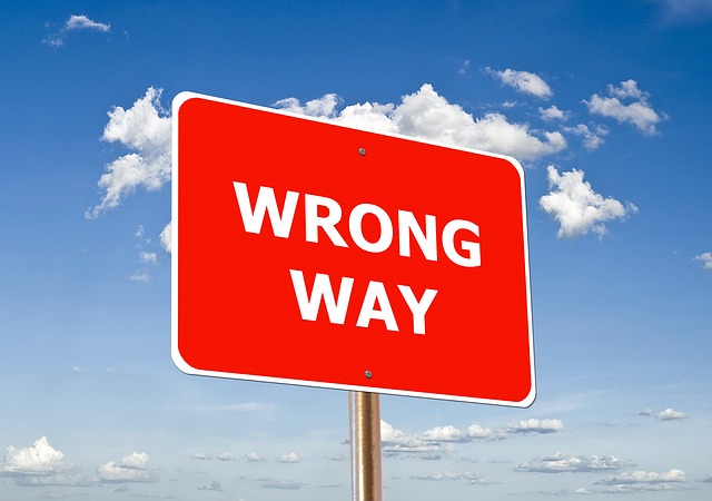 Wrong Way Sign Warns Homeowners Against Garage Spring Mistakes