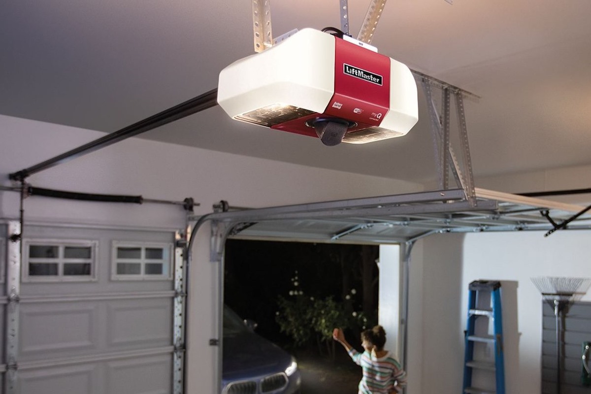 Red Liftmaster opener on ceiling of two-car garage door