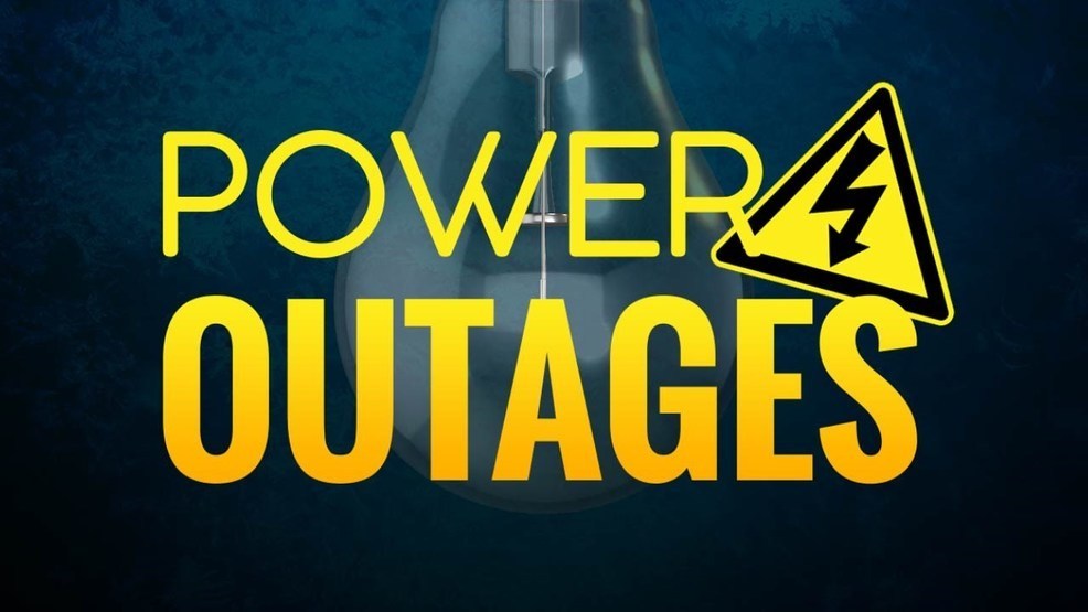'POWER OUTAGES' in yellow font with animated lightbulb and adjacent road sign image