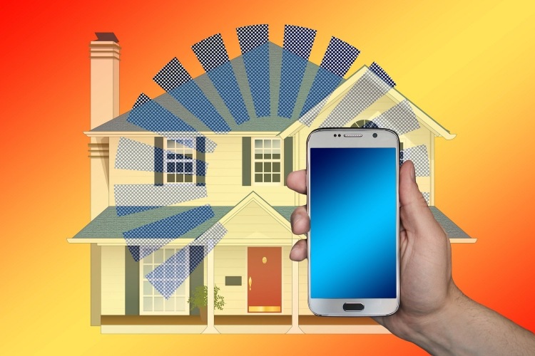 Hand holding Android smartphone with animated phone signal and two-story house in background