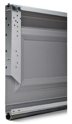 Corner of white non-insulated garage door model